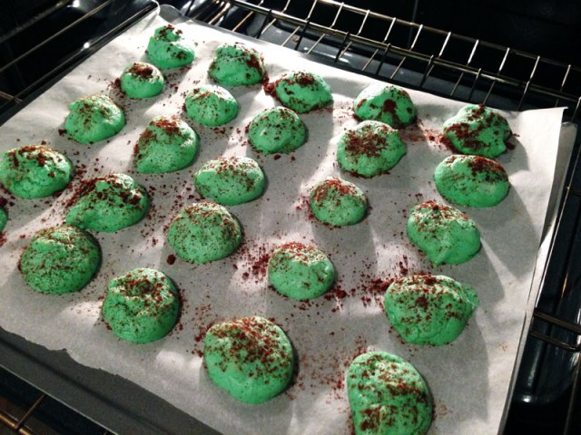 mint chocolate meringues in oven add cocoa