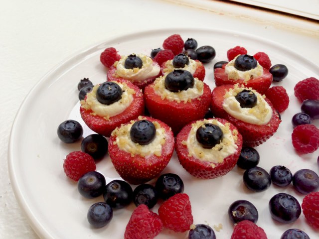 finished red white and blue cheesecake strawberries