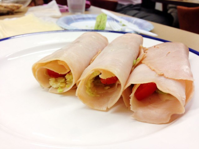 Turkey, swiss and avocado rolls - 3 finished rolls with tomato